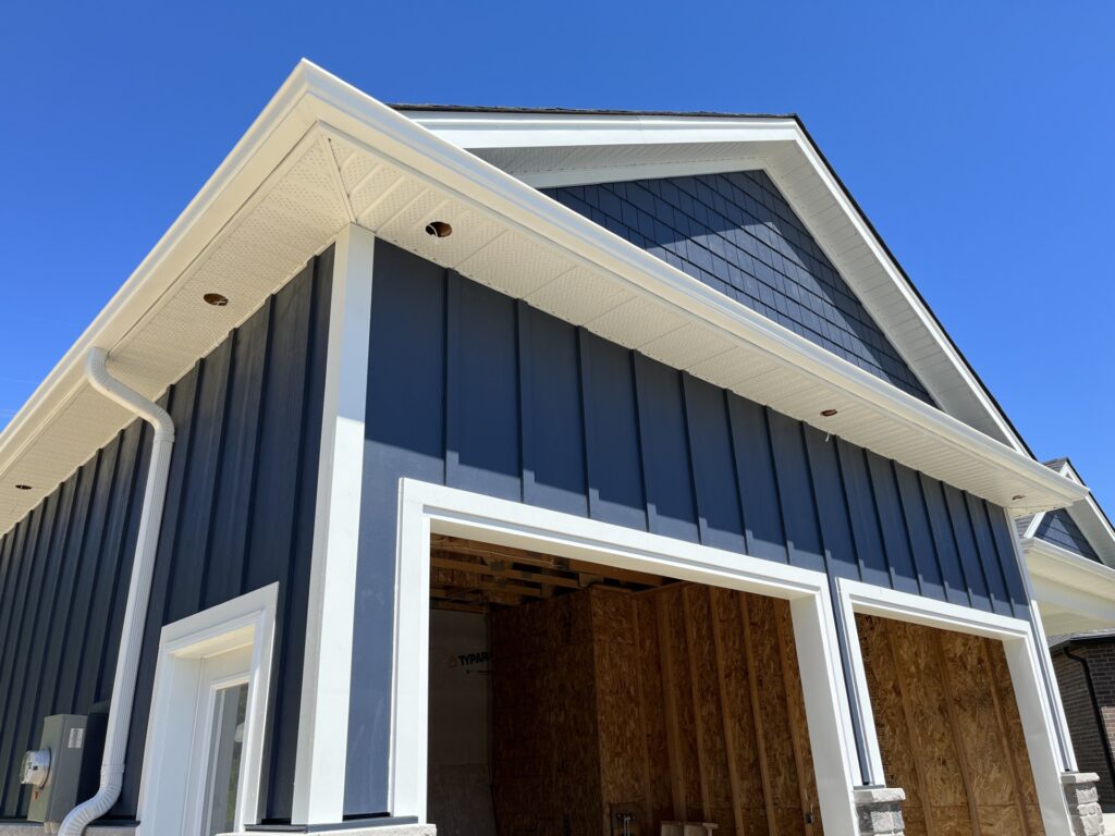 Home exterior project to install siding, soffit, and fascia performed by Distinct Exteriors in Tillsonburg Ontario.